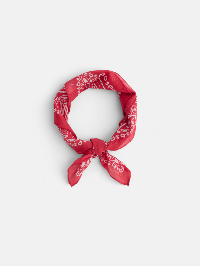 The Two Tone Bandana in Cotton, crafted in Italy from red cotton voile with a white paisley pattern, is loosely knotted and displayed on a plain white background.