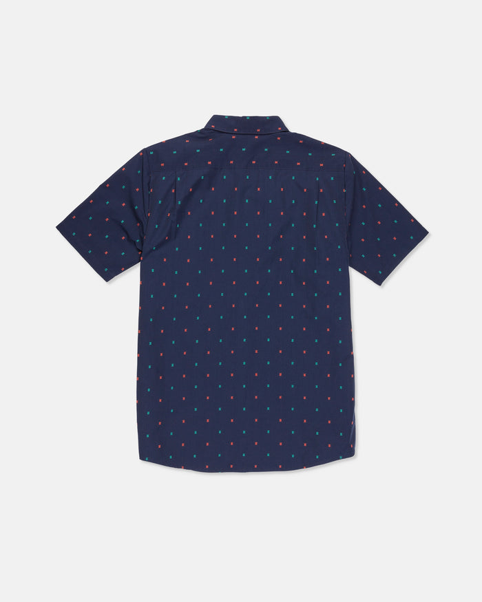 Boy's Bankstone Short Sleeve Shirt by Volcom in navy blue, featuring a subtle multicolor dotted allover print, designed with a boxy fit and shown from the back against a plain white background.