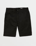 A pair of black Volcom Kids' Frickin Chino Shorts 16" with a modern fit, front pockets, belt loops, and a button closure is laid flat on a white background.