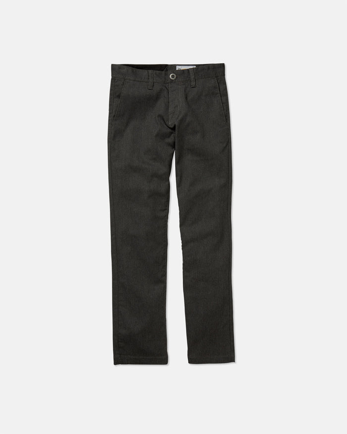 The Volcom Kids' Big Boys' Frickin Modern Stretch Pants are straight-cut, dark gray pants with a button closure, front pockets, and belt loops, made from recycled fibers and shown laid flat on a white background.