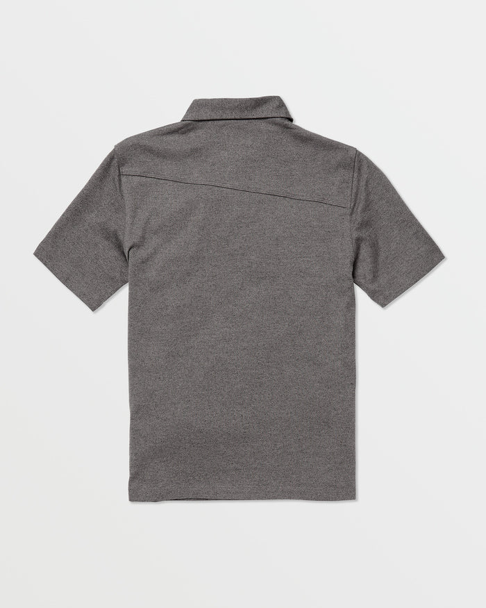 The Volcom Kids' Wowzer Polo Short Sleeve Tee is shown in heather gray, laid flat with the back side up. This modern fit polo features a straight hem, simple collar, and soft cotton-poly blend on a plain white background.
