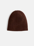 The Cashmere Beanie in brown features a ribbed knit design and is displayed on a plain white background, providing a soft and warm feel for cold days.