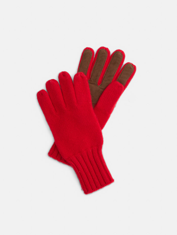 A pair of Cashmere Leather Palm Gloves in red, with one glove featuring brown suede-like leather palms and fingers, displayed on a white background.