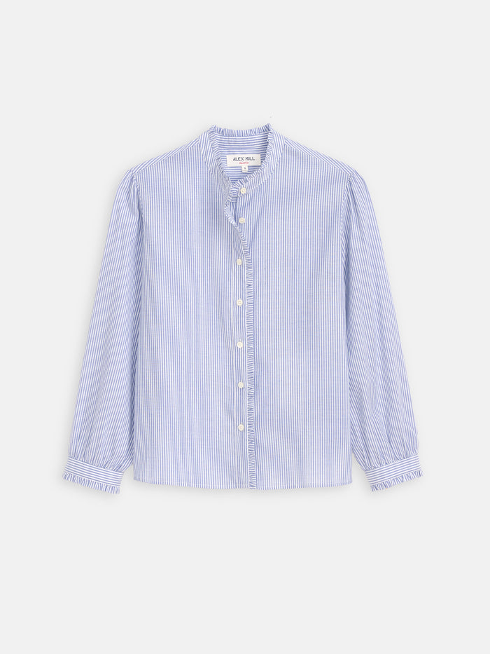 The Chantilly Striped Ruffle Shirt in Cotton Voile is a blue and white women's top, French-inspired and crafted from 100% cotton for classic style and comfort.