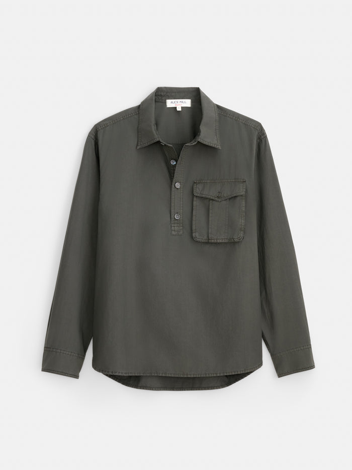 A long-sleeve Clint Popover in Cotton Poplin men’s shirt in dark green, made from garment-dyed cotton poplin, featuring a button-up front with a collar and a single chest pocket, displayed flat against a white background.
