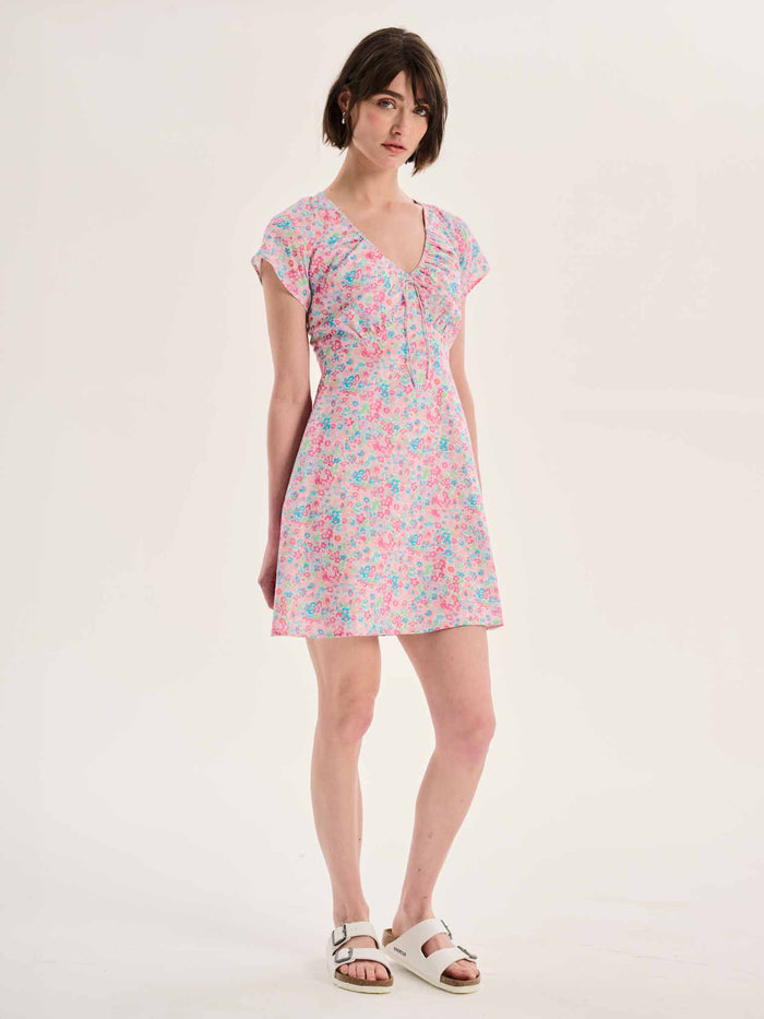 Dotty V Neck Ruched Mini Dress in Floral Print