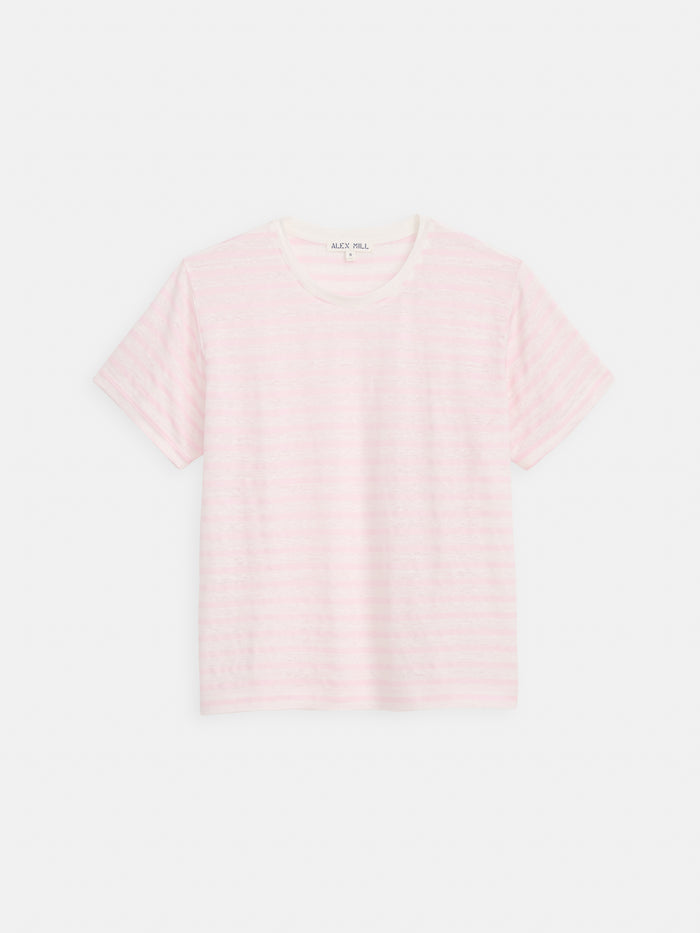 The Garcon Striped Tee in Linen Cotton features light pink and white stripes, short sleeves, a crew neckline, and a classic fit. Its simple design is perfect for year-round casual wear. Shown laid flat on a white background.