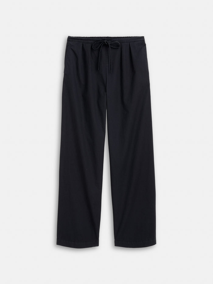 The Hudson Pant in Cotton Twill is a black, pull-on wide leg style with an elastic waistband and drawstring, shown against a plain white background.