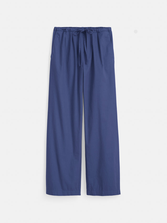 The Hudson Pant In Cotton Twill is a pair of loose-fitting, blue wide leg pull-on pants with side pockets, crafted from comfortable cotton twill fabric and displayed flat against a white background.