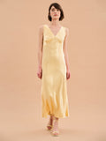 yellow satin maxi dress with v neck and ruching detail