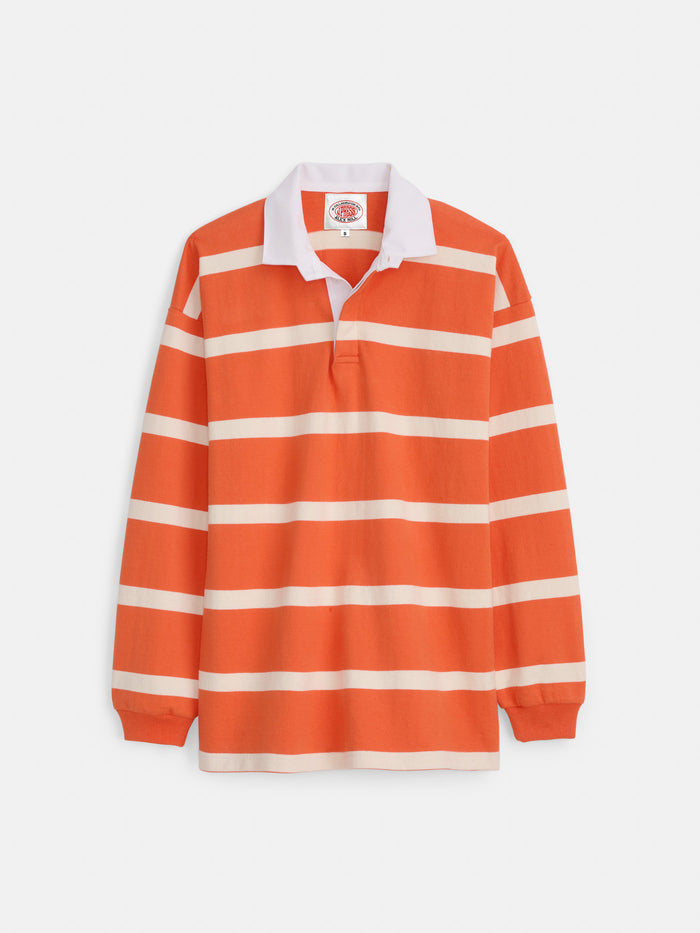 The J.Press x Alex Mill Rugby Striped Shirt In Cotton features heavyweight orange and white stripes, a classic white collar, relaxed fit, and is made in the USA. Displayed against a white background.