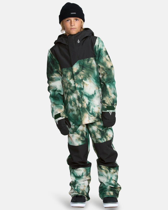 A young person dressed in the Kids' Barkley Insulated Bib Overall, a black and green tie-dye winter jacket with matching pants, plus a black beanie, gloves, and snow boots, stands against a white background.