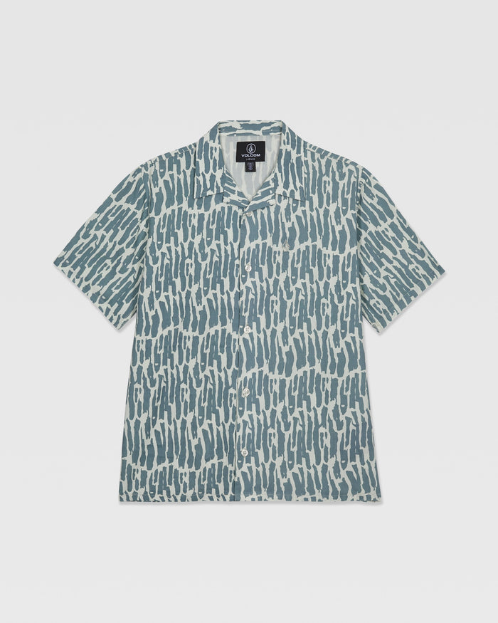 The Volcom Kids' Boldstone Short Sleeve Tee features a boxy fit, collar, and button-up front with an allover abstract blue and white brushstroke print. It's shown laid flat on a white background.