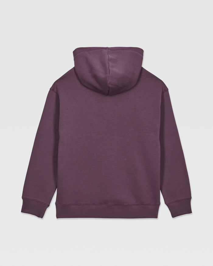 The Volcom Kids' Watanite Pullover is a plain, dark purple hoodie for boys, shown from the back. It features heavyweight fleece, a hood, long sleeves, and ribbed cuffs and waistband with no visible logos or designs.