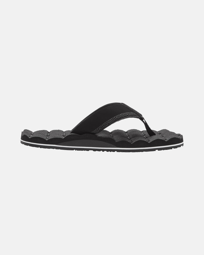 The Volcom Kids' Recliner 2 Big Youth sandal is a black flip-flop with a cushioned, textured sole and comfort foam footbed. It features a wide fabric thong strap and is shown in side profile on a plain white background.