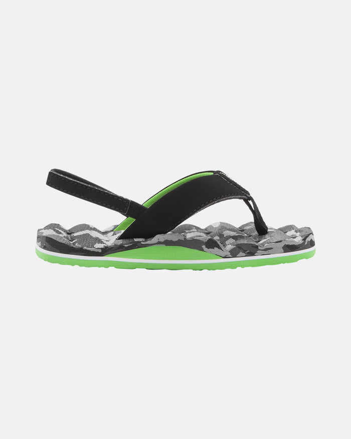 The Volcom Kids' Recliner 2 Little Youth sandal features a black strap and heel band, camouflage-patterned sole in green, black, and gray, thong design, green midsole, comfort foam footbed, and is water friendly for all-day support.