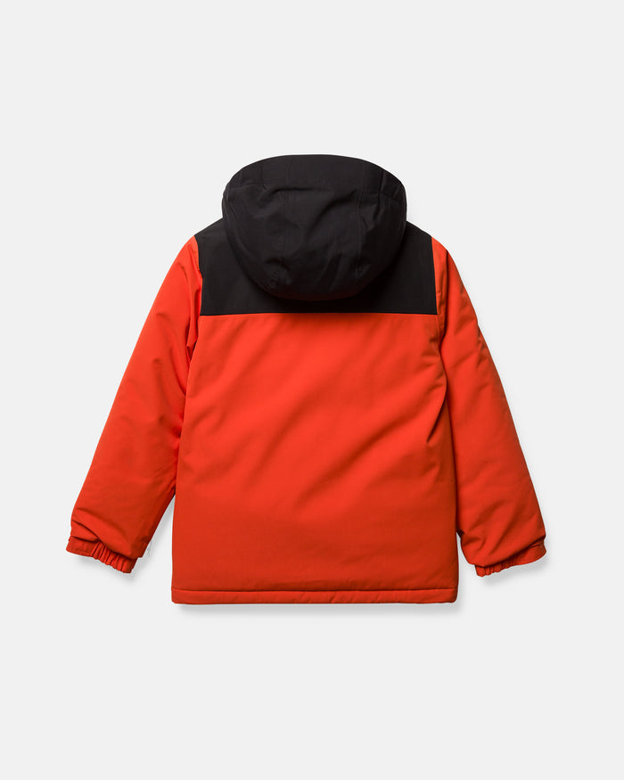The Volcom Kids’ Youth Stone.91 Insulated Jacket is shown from the back against a plain white background in red, featuring a black hood and black shoulder panel. This jacket offers long sleeves, elastic cuffs, and recycled insulation for added warmth and sustainability.