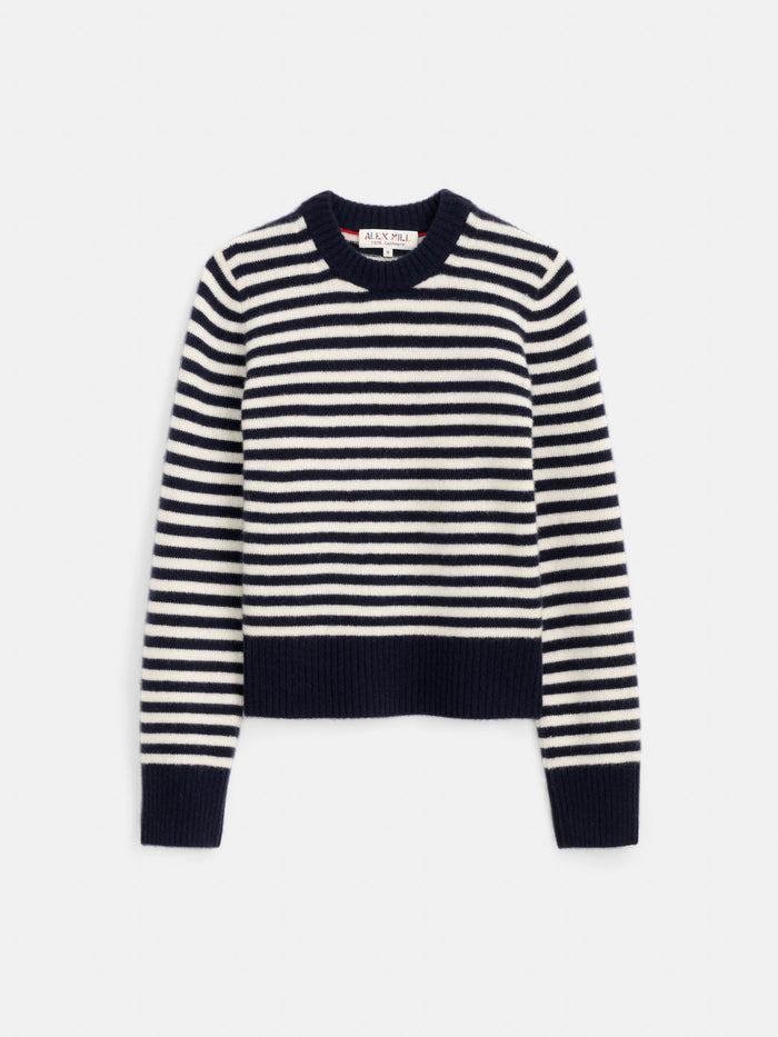 The Marais Striped Sweater in Washed Cashmere, featuring navy blue and white stripes, a crew neck, and ribbed cuffs, hem, and collar, is crafted from extra soft cashmere and displayed laid flat on a white background.
