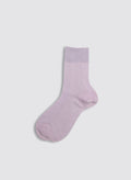 A single Maria La Rosa Bio Cotton Ribbed Sock in light purple with a ribbed texture and solid cuff, shown on a plain light gray background.
