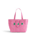 Introducing the Memorial Sloan Kettering Cancer Center × Alex Mill Perfect Weekday Tote—a personalized pink bag featuring two sturdy handles and bold green “BAM” lettering on the front. Set against a plain white background, this standout tote is perfect for supporting breast cancer research or expressing your unique style.