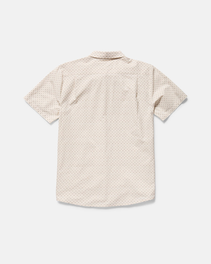 The Volcom Men's Bankstone II Short Sleeve Tee, in light beige with a subtle dobby dot texture and classic fit, is shown from the back against a plain white background.