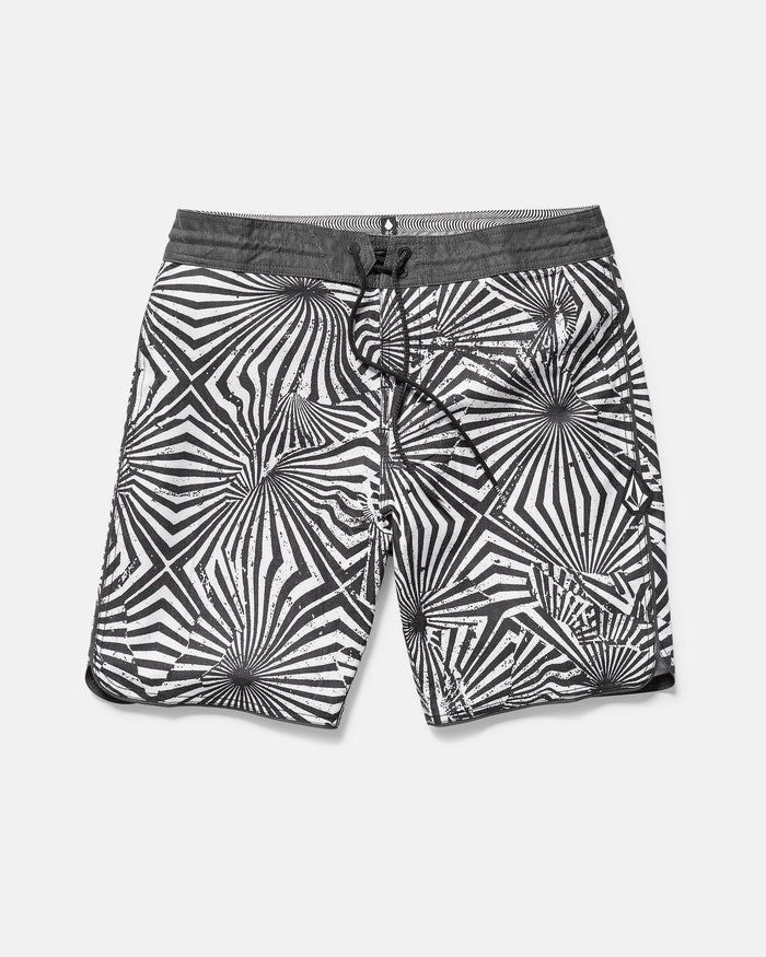 Black and white patterned shorts on a light gray background