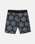 Men's Barnacle Stoney board shorts by Volcom, featuring a black base with a white and gray circular geometric pattern, a black drawstring waistband, and a small white Volcom logo on the left leg. Made from a comfortable hemp-cotton blend, these shorts are displayed flat on a white background.