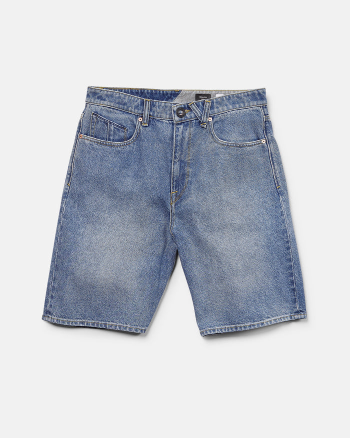 A pair of Volcom Men's Billow Denim Shorts in blue, featuring a loose fit, five-pocket design, and button closure, laid flat on a white background.