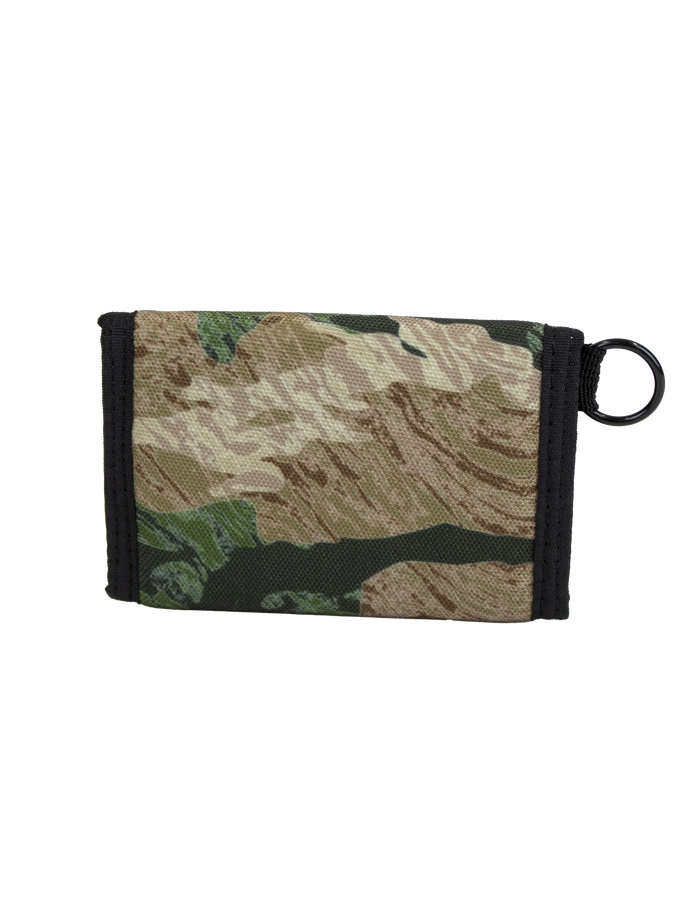 The Volcom Men's Box Stone Wallet features a camouflage-patterned cotton canvas design with black trim and a black key ring attached to one side, displayed against a white background.