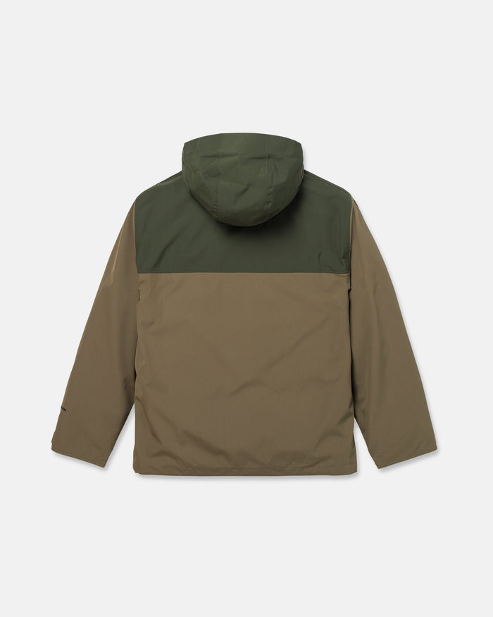 The Volcom Men’s Buckthreeeighty Insulated Jacket is shown from the back, featuring a two-tone design with a dark green upper section and hood, and light brown lower part and sleeves. Crafted from recycled fabric, this jacket has long sleeves and no visible fastenings.