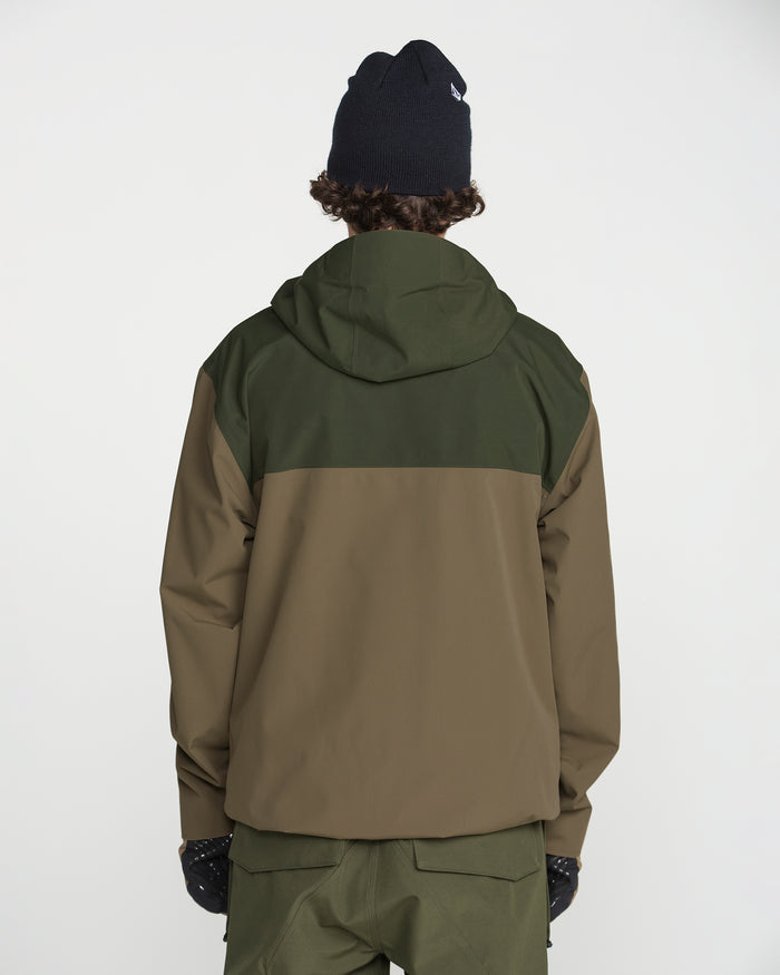 A person is shown from the back against a plain white background, wearing a black beanie and matching pants, along with the Volcom Men’s Buckthreeeighty Jacket—a baggy fit, two-tone green and brown hooded V-Science 2-Layer jacket.