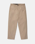 Volcom Men's Capreezy Elastic Waist Pants in beige khaki, featuring a button closure, straight legs, and crafted from pre-laundered twill, are shown laid flat on a white background.