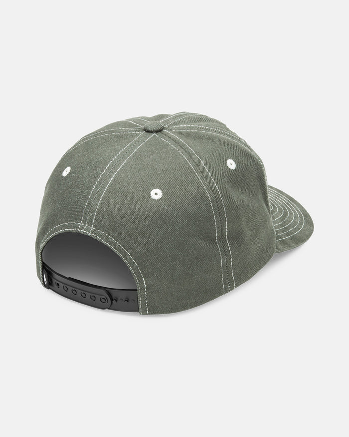 The Volcom Men's Chops Adjustable Hat is a dark green cotton twill baseball cap with white stitching, black snapback closure, white eyelets for ventilation, and subtle graphic embroidery at the back.