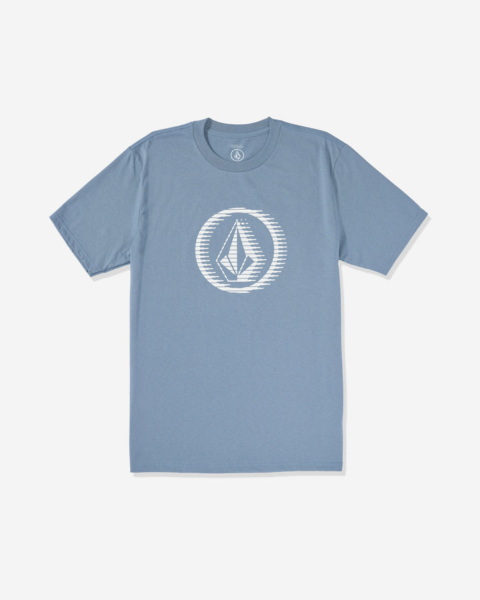 The Volcom Men's Circle Stone Short Sleeve Tee is a light blue 100% cotton shirt featuring a white geometric diamond logo with circular stripes on the chest, shown against a plain white background.