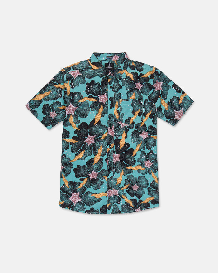 The Volcom Men's Concrete Jungle Short Sleeve Shirt features a bold, abstract pattern in teal, black, pink, and yellow. Crafted for a classic fit from breathable cotton-viscose fabric, this button-up shirt includes a collar and is displayed laid flat on a white background. Perfect for those who appreciate the vibrant appeal of a floral print with modern flair.