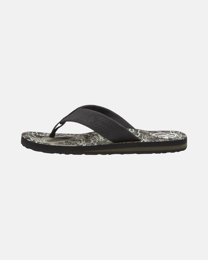 The Volcom Men's Daycation 2 Hawaii Sandal is shown in black with a patterned sole and textured straps, displayed in a side profile view on a plain white background.