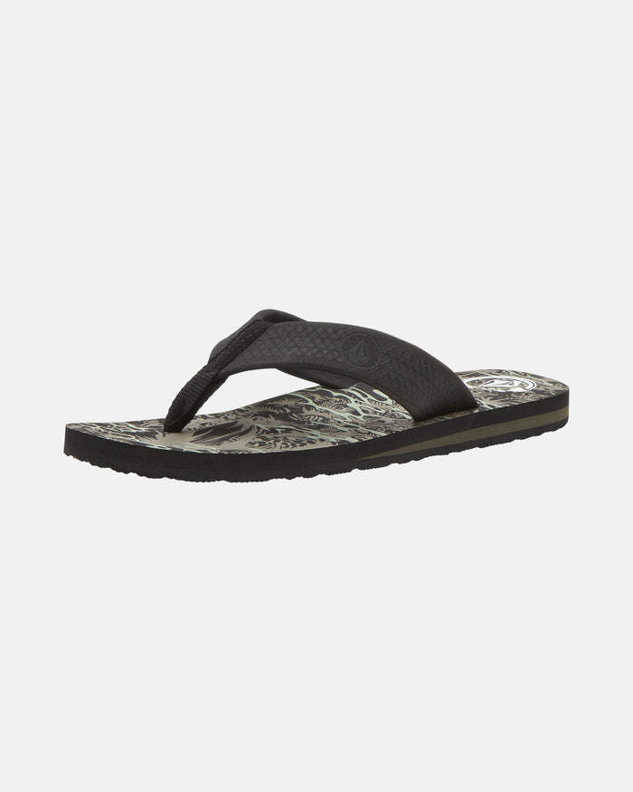 The Volcom Men's Daycation 2 Hawaii Sandal is a single black flip-flop featuring a textured strap and patterned insole, shown on a white background.