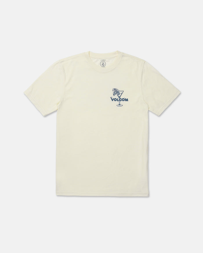 The Men's Dive Bar Short Sleeve Tee by Volcom features a cream color with a modern fit and short sleeves. Made from a soft ringspun cotton-poly blend, this t-shirt displays a small blue "VOLCOM" graphic on the left chest and showcases an illustration of a woman sitting on the rim of a cocktail glass.