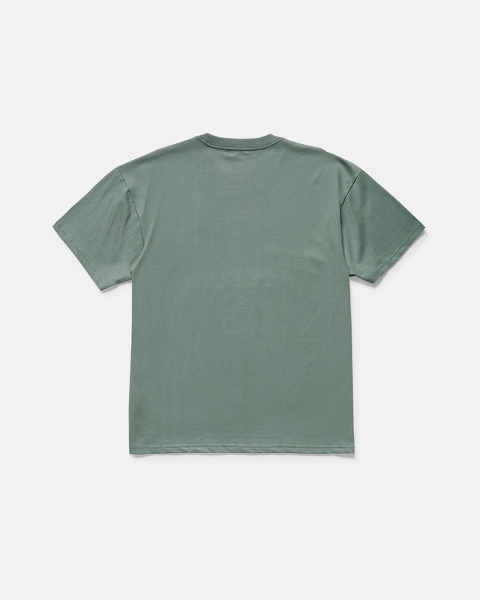 The Volcom Men's Duster Short Sleeve Tee is shown from the back, laid flat on a white background. This sage green, loose-fit tee is made from heavyweight organic cotton.