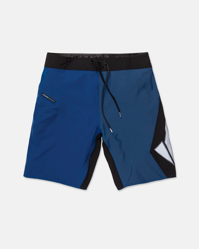 Volcom Men's Foster Mod boardshorts in blue and black feature a black waistband, adjustable black drawstring, and a geometric pattern on the right leg. Designed with a loose fit, these 21" shorts include a small zippered side pocket on the left for secure storage.