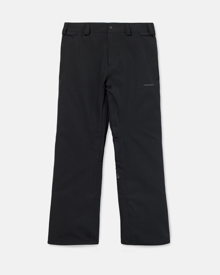The Volcom Men’s Freakin Snow Chino Pants feature a classic black straight-leg design with belt loops, a zip fly, and two side pockets, shown here laid flat on a white background. A small Volcom logo accents the right thigh. Crafted from waterproof, breathable fabric, these men’s ski pants deliver reliable comfort and performance on the slopes.