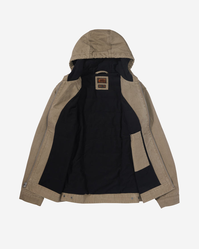 The Volcom Men's Freshdust Workwear Jacket is tan with a hood, large hand and chest pockets, an inner left pocket, dark lining, a zip front with metal snap buttons, and a Volcom Workwear label near the collar.