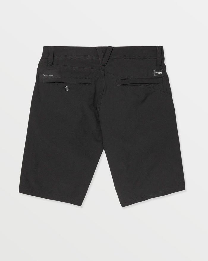 Back view of Volcom Men's Frickin Cross Shred 20" Shorts in black, featuring belt loops, two back pockets—one buttoned, one open—and a small rectangular brand label above the right pocket.
