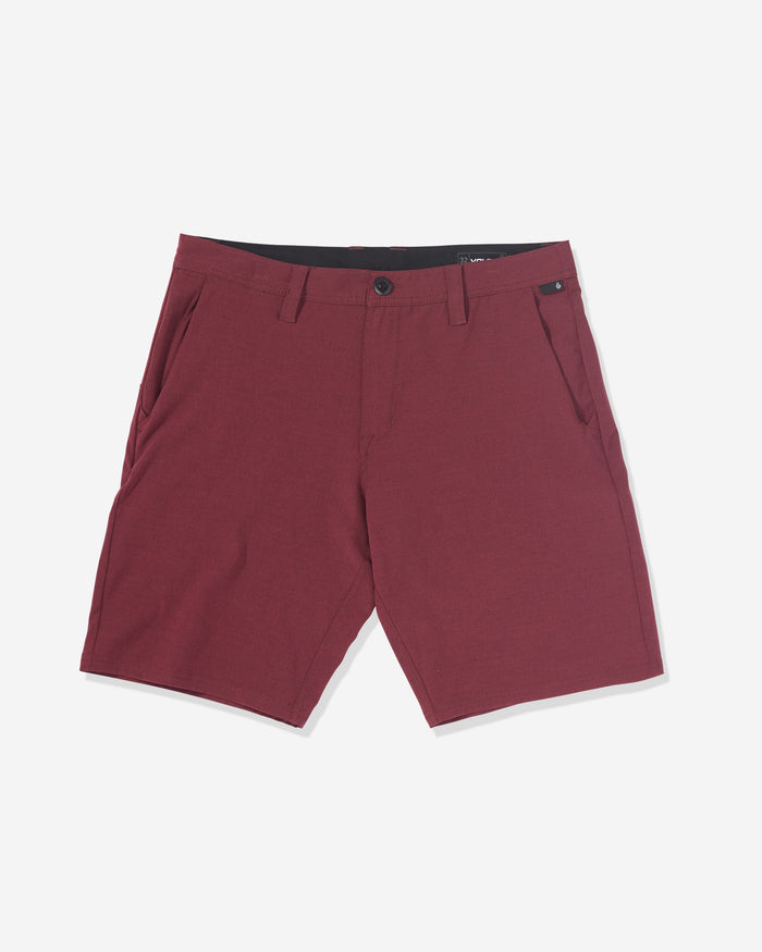 The Volcom Men's Frickin Cross Shred Static Shorts are modern-fit maroon shorts with belt loops, button closure, and side pockets, featuring a clean, solid look in classic Volcom style, shown on a white background.