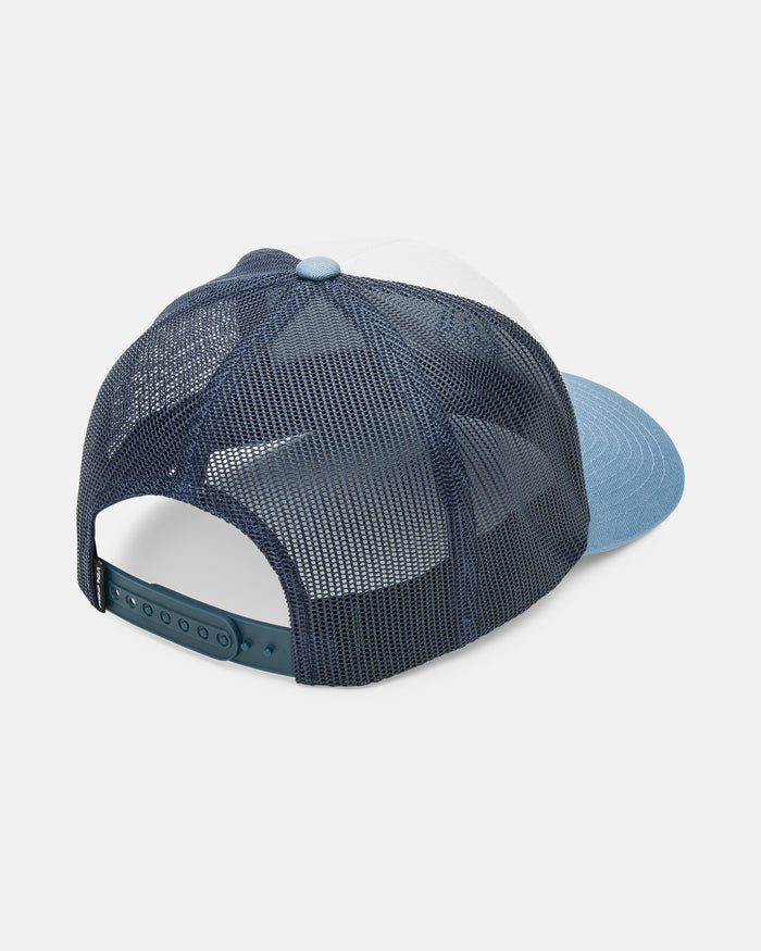 The Volcom Men's Full Stone Cheese trucker hat is shown from the back, featuring a blue and white design with mesh back panels, an adjustable snapback closure, and a light blue brim.
