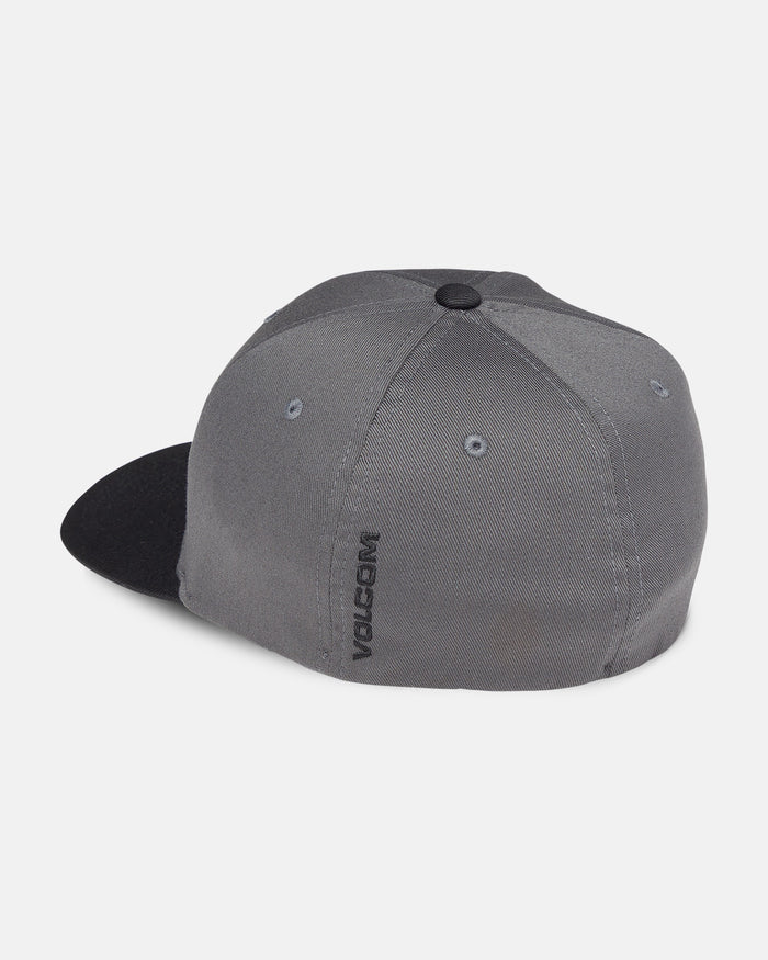The Volcom Men's Full Stone Flexfit Hat is shown from the back in gray and black, featuring a black brim, a side Volcom logo in black, and a structured stretch twill build for comfort and an ideal fit.