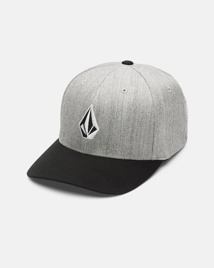 The Volcom Men's Full Stone Heather Flexfit Hat, shown against a white background, features a gray structured stretch twill design with a black brim and is finished with a black-and-white geometric Volcom logo on the front.