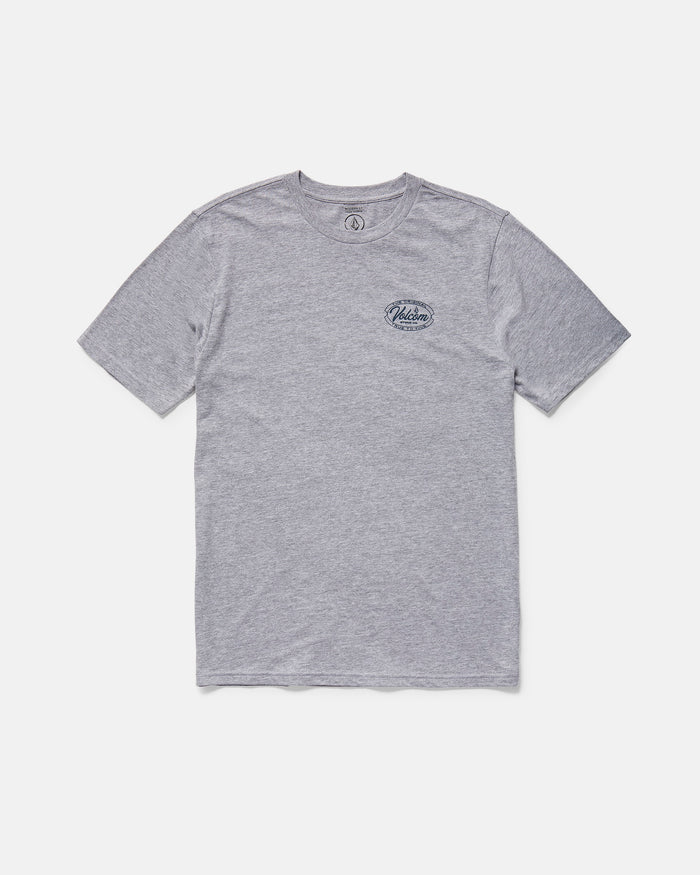 The Volcom Men's Garaged Short Sleeve Tee is a modern fit, heather gray shirt with a small dark graphic and text on the left chest, shown laid flat on a white background.