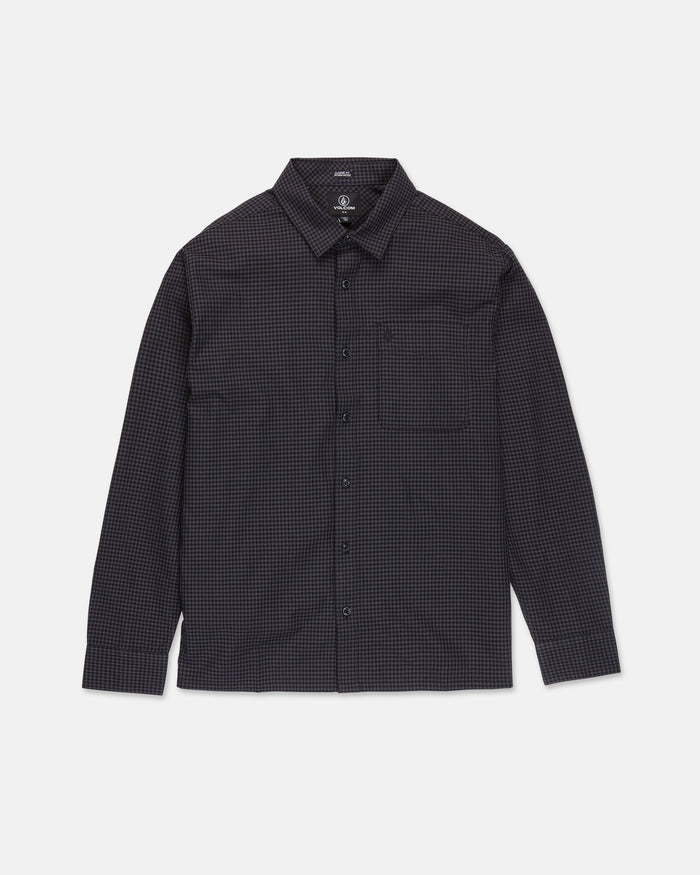 The Volcom Men's Glasnow Long Sleeve Shirt is a button-up, boxy fit style featuring a small black and dark blue checkered pattern, collar, and chest pocket. Crafted from yarn-dyed dobby texture fabric, it is shown laid flat against a white background.