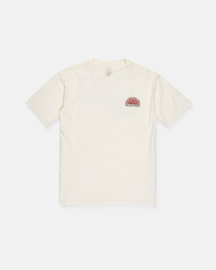 The Men's Helios Short Sleeve Tee by Volcom is a premium, cream-colored, short-sleeve shirt made from 190g cotton for all-day comfort. It features a small red sun graphic and "VOLCOM STONE" text on the left chest and is displayed laid flat on a white background.
